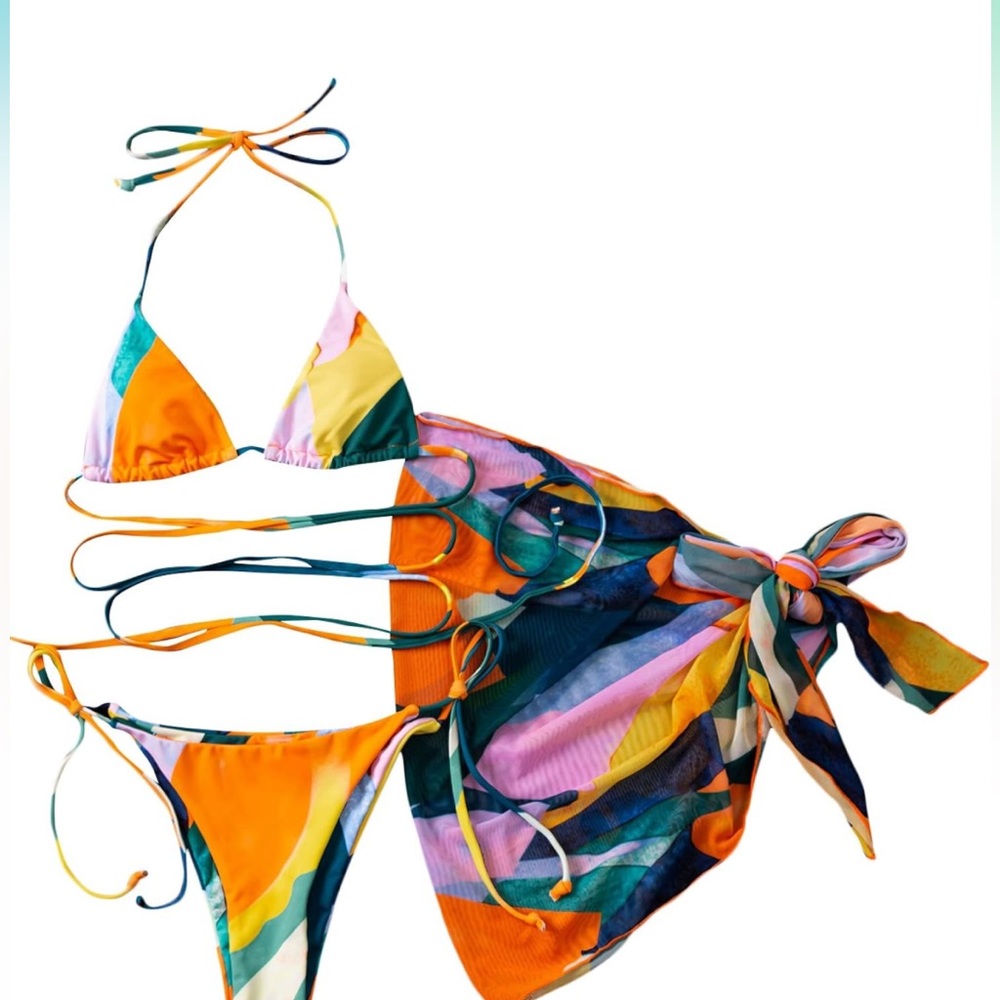 Bikini set with cover up. Never worn. With liner